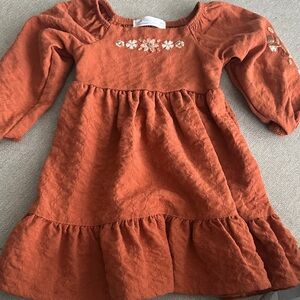 Charming Kids Orange Dress with Floral Detail
